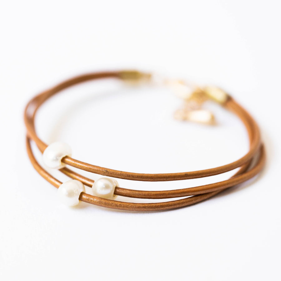 Nest Pretty Things - Pearl and leather adjustable shimmer bracelet: Bronze